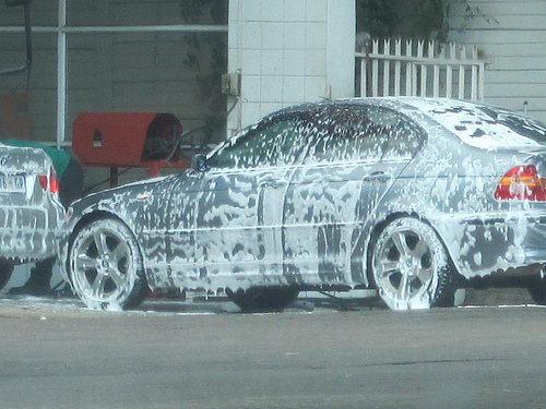 Car being washed before Stone-shield is applied